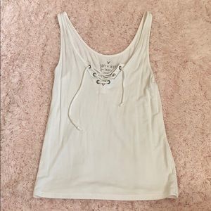 Soft and sexy, cream draw string tank top.